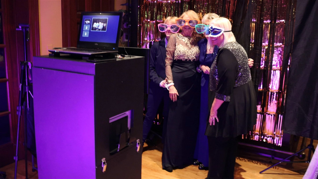 Photo booth set up for a wedding event by All Star Entertainment KY